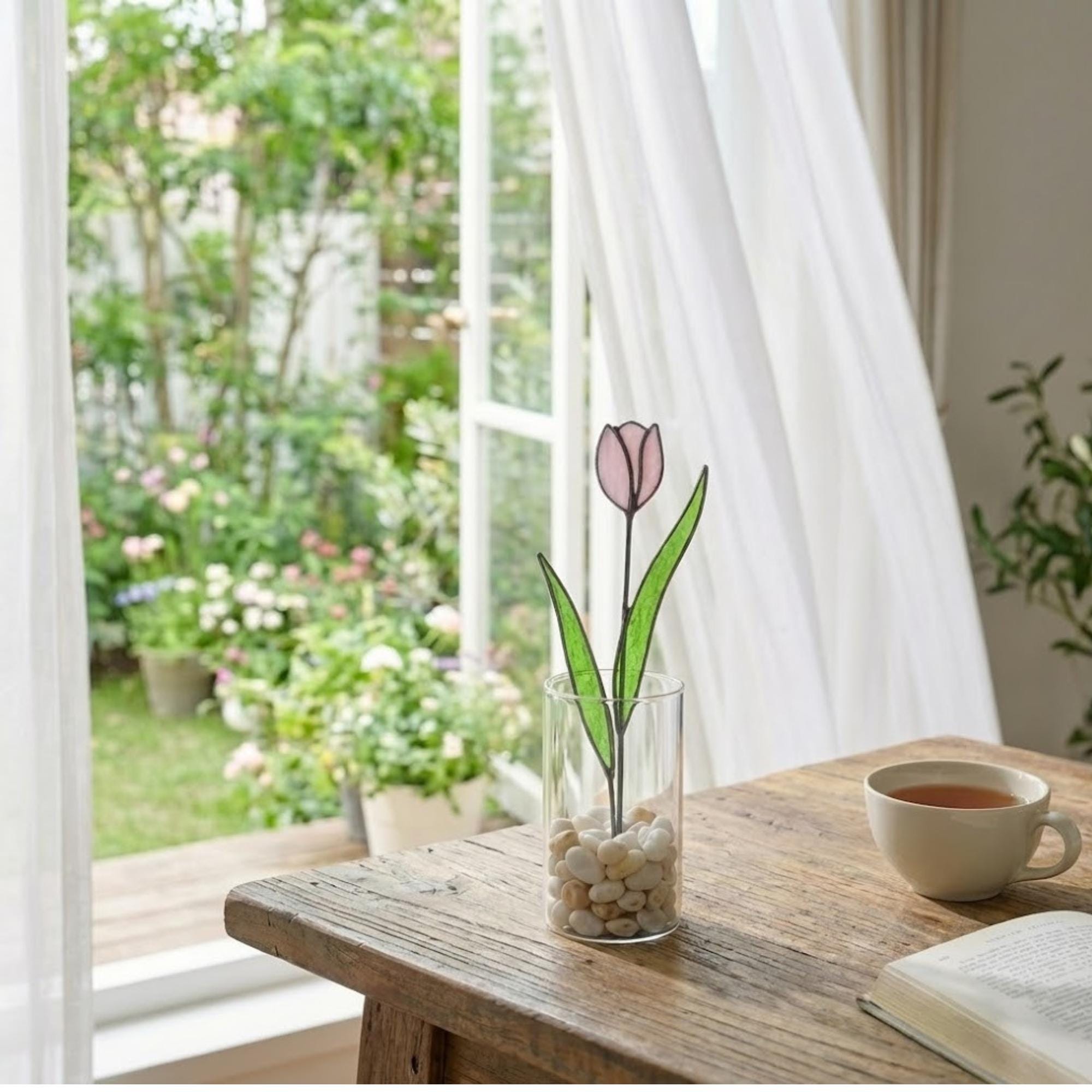 Pink stained glass tulip bouquet 3D flower stems held in hands as Mother's Day gift forever floral art casting colored shadows spring home decor handmade by LuzyGlassArt.