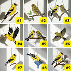 Stained glass American Goldfinch suncatcher hanging on window casting yellow shadows, vibrant yellow bird ornament for birdwatchers, handmade state bird gift for New Jersey Iowa Washington by LuzyGlassArt.