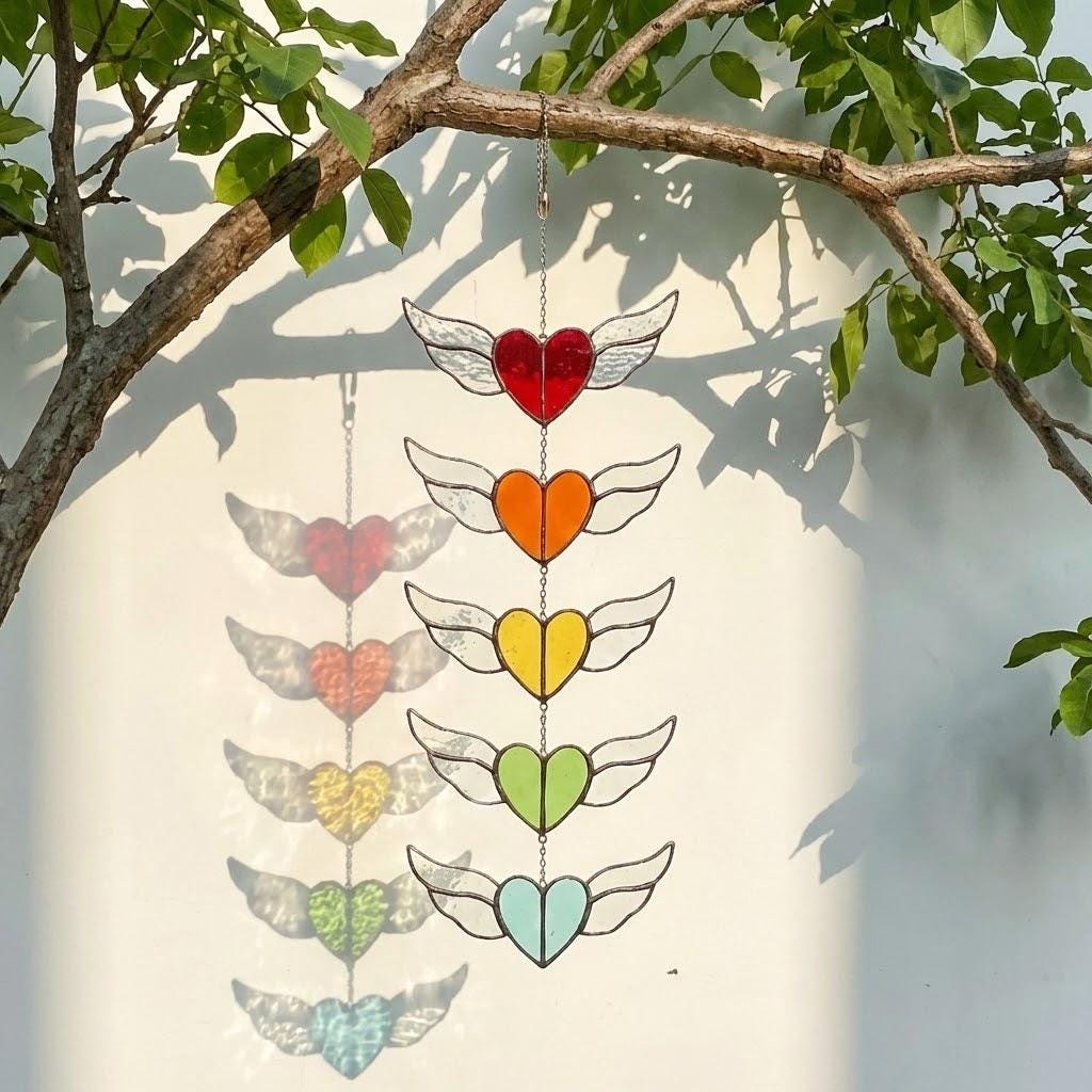 Stained glass heart suncatcher with angel wings in 7 chakra rainbow colors, hanging window decor for healing and valentine gift.