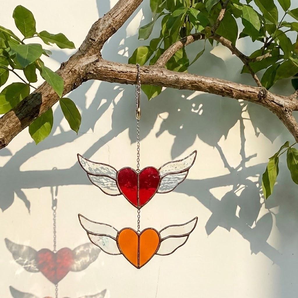 Stained glass heart suncatcher with angel wings in 7 chakra rainbow colors, hanging window decor for healing and valentine gift.