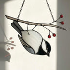 Stained glass Black-capped Chickadee bird suncatcher on branch hanging on window, handmade Maine and Massachusetts state bird gift, realistic nature decor by LuzyGlassArt.