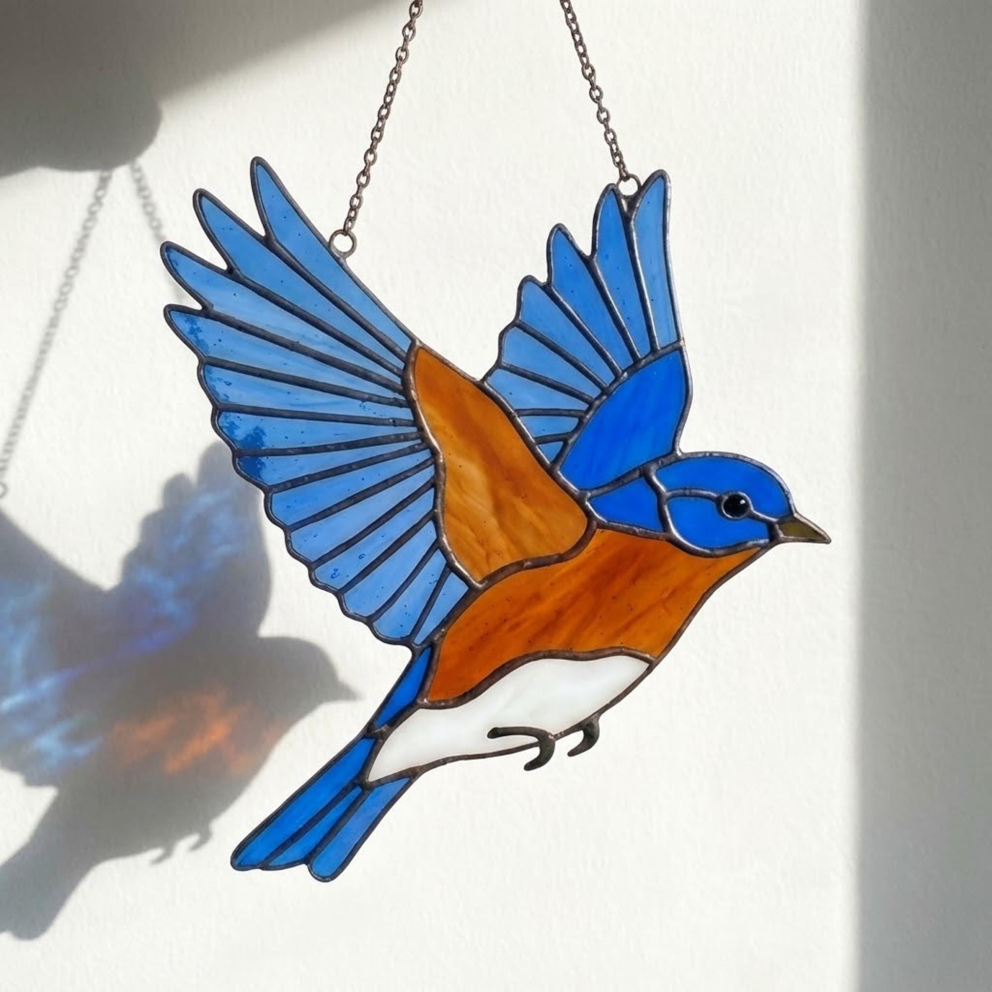 Stained glass Eastern Bluebird suncatcher with blue wings and orange breast hanging on window, handmade blue bird of happiness gift for mom, New York and Missouri state bird decor by LuzyGlassArt.