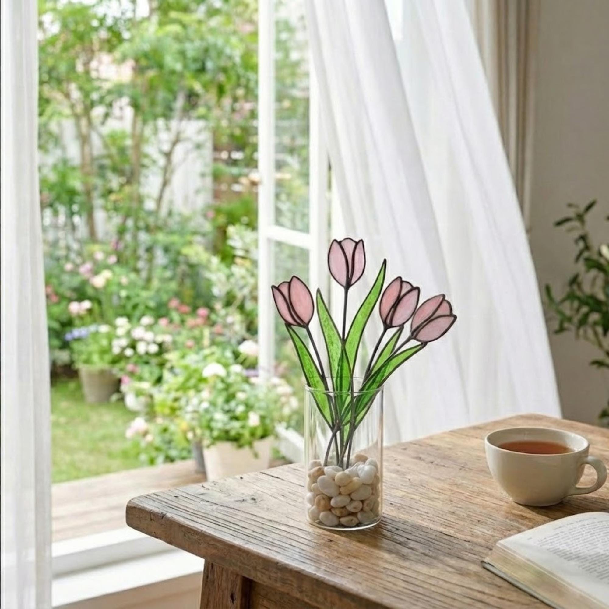 Pink stained glass tulip bouquet 3D flower stems held in hands as Mother's Day gift forever floral art casting colored shadows spring home decor handmade by LuzyGlassArt.