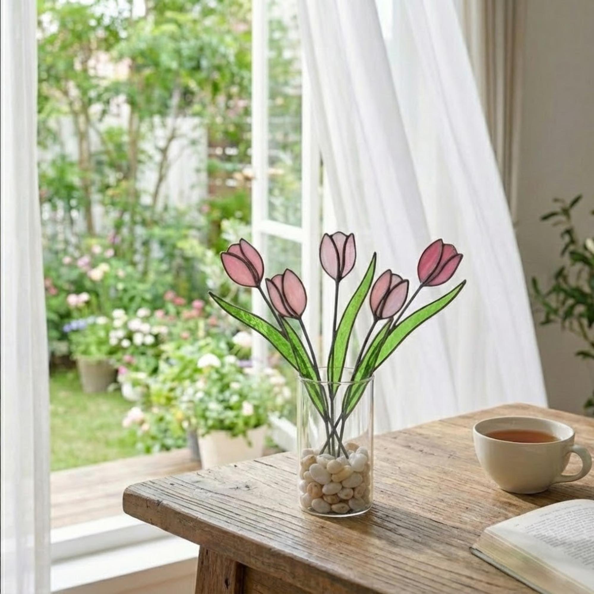 Pink stained glass tulip bouquet 3D flower stems held in hands as Mother's Day gift forever floral art casting colored shadows spring home decor handmade by LuzyGlassArt.