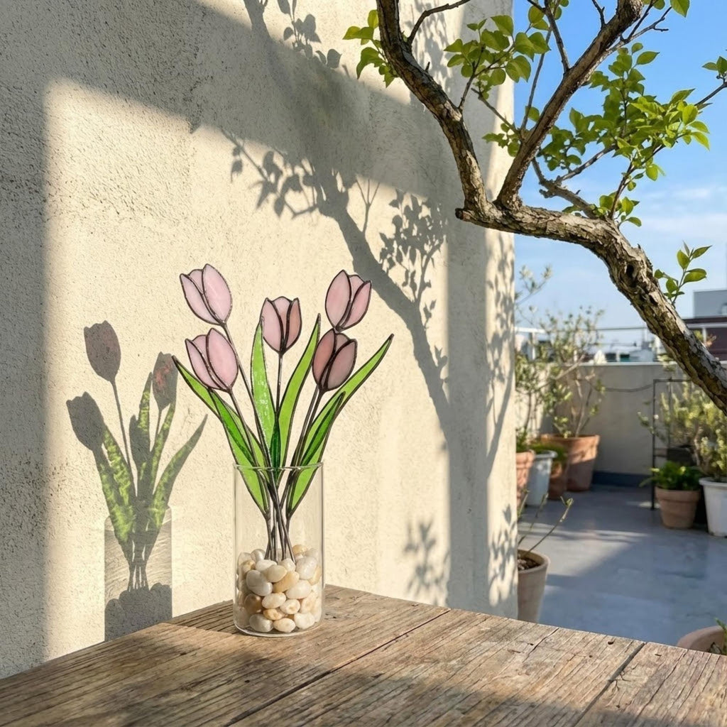 Pink stained glass tulip bouquet 3D flower stems held in hands as Mother's Day gift forever floral art casting colored shadows spring home decor handmade by LuzyGlassArt.