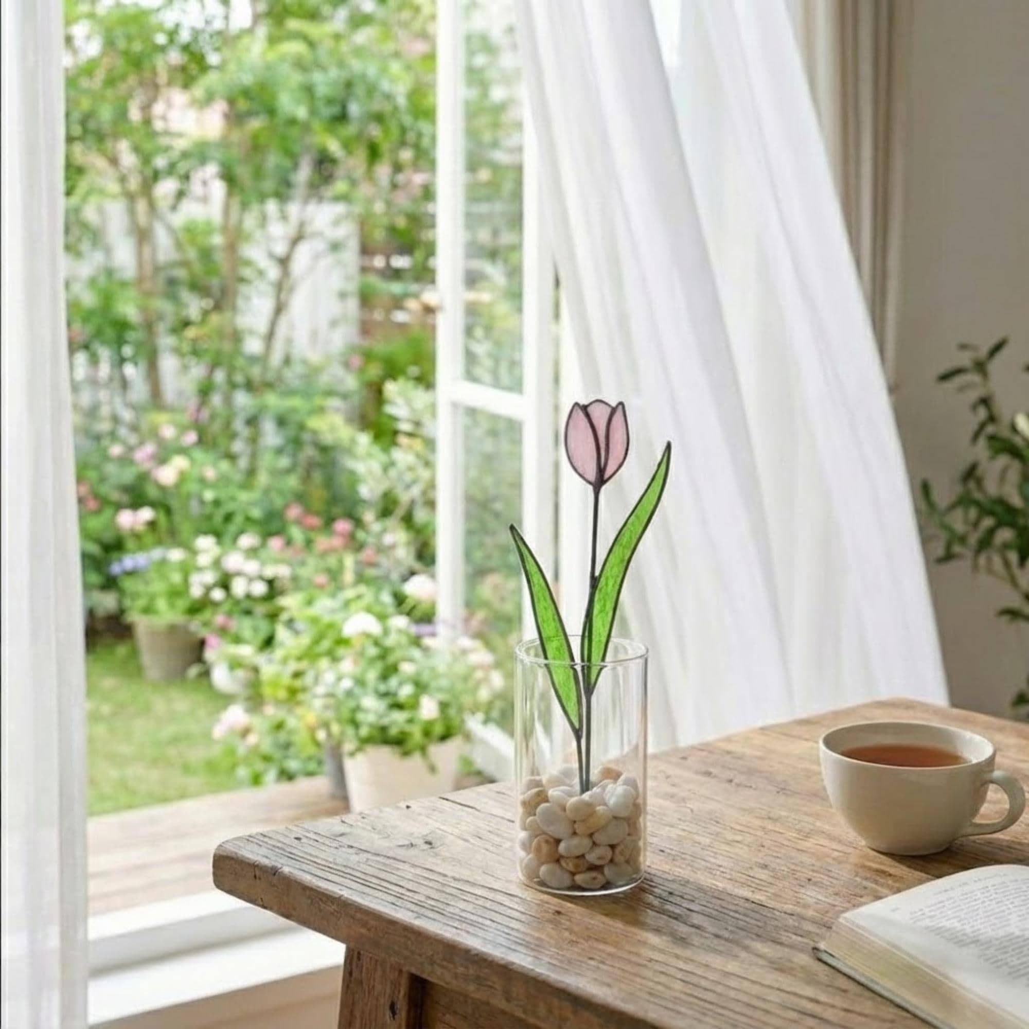 Pink stained glass tulip bouquet 3D flower stems held in hands as Mother's Day gift forever floral art casting colored shadows spring home decor handmade by LuzyGlassArt.