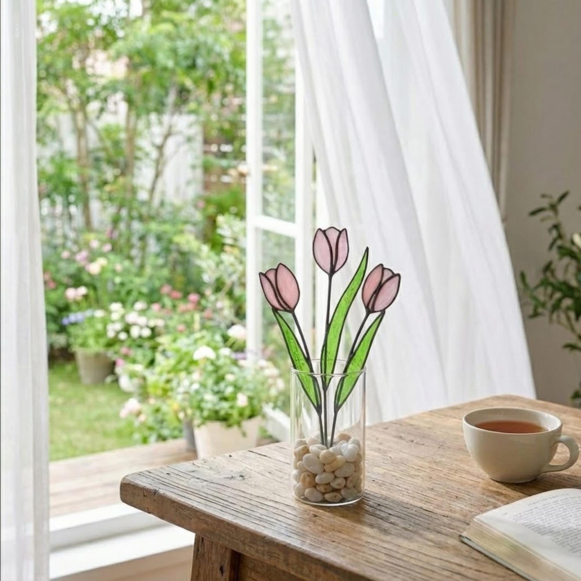 Pink stained glass tulip bouquet 3D flower stems held in hands as Mother's Day gift forever floral art casting colored shadows spring home decor handmade by LuzyGlassArt.