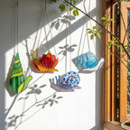 Cute stained glass snail suncatcher hanging on window, whimsical cottagecore decor for plant lovers, colorful glass animal art handmade in Vietnam, goblincore aesthetic gift.