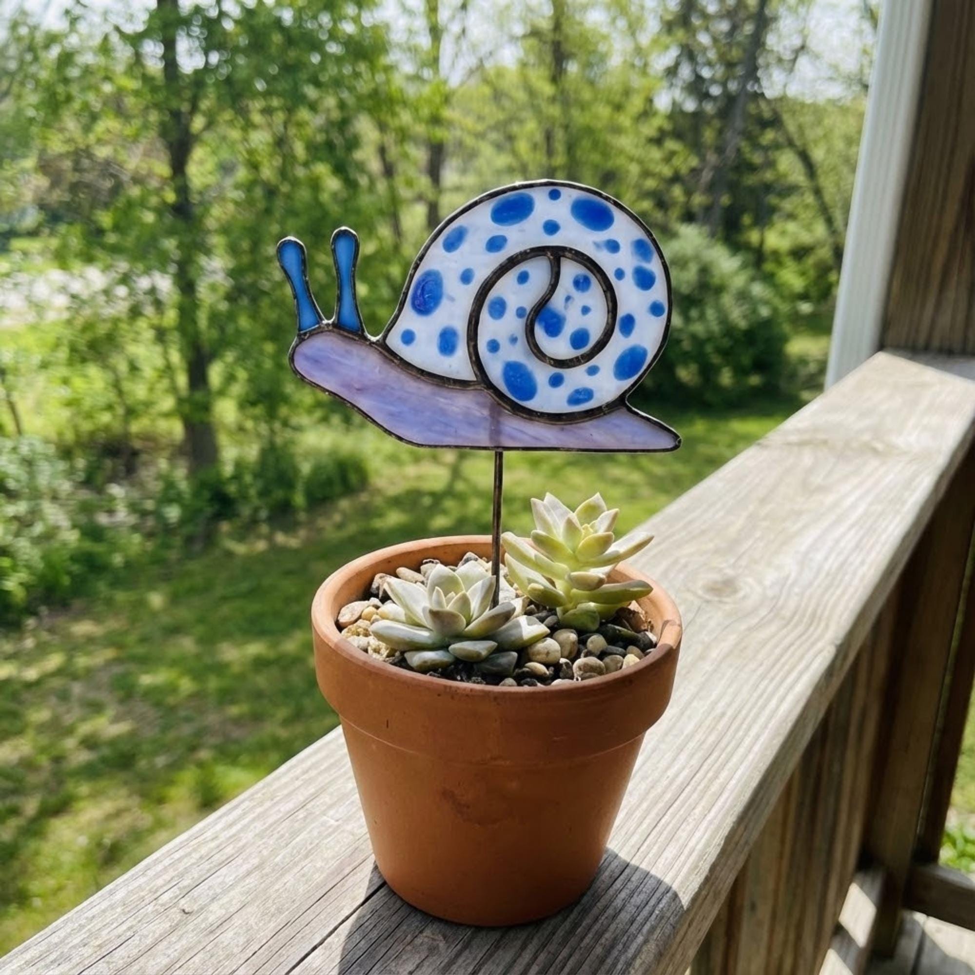 Cute stained glass snail suncatcher hanging on window, whimsical cottagecore decor for plant lovers, colorful glass animal art handmade in Vietnam, goblincore aesthetic gift.