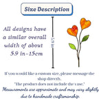 Colorful stained glass heart plant stakes with green leaves in a flower pot, gift box packaging, garden decor for plant lovers.