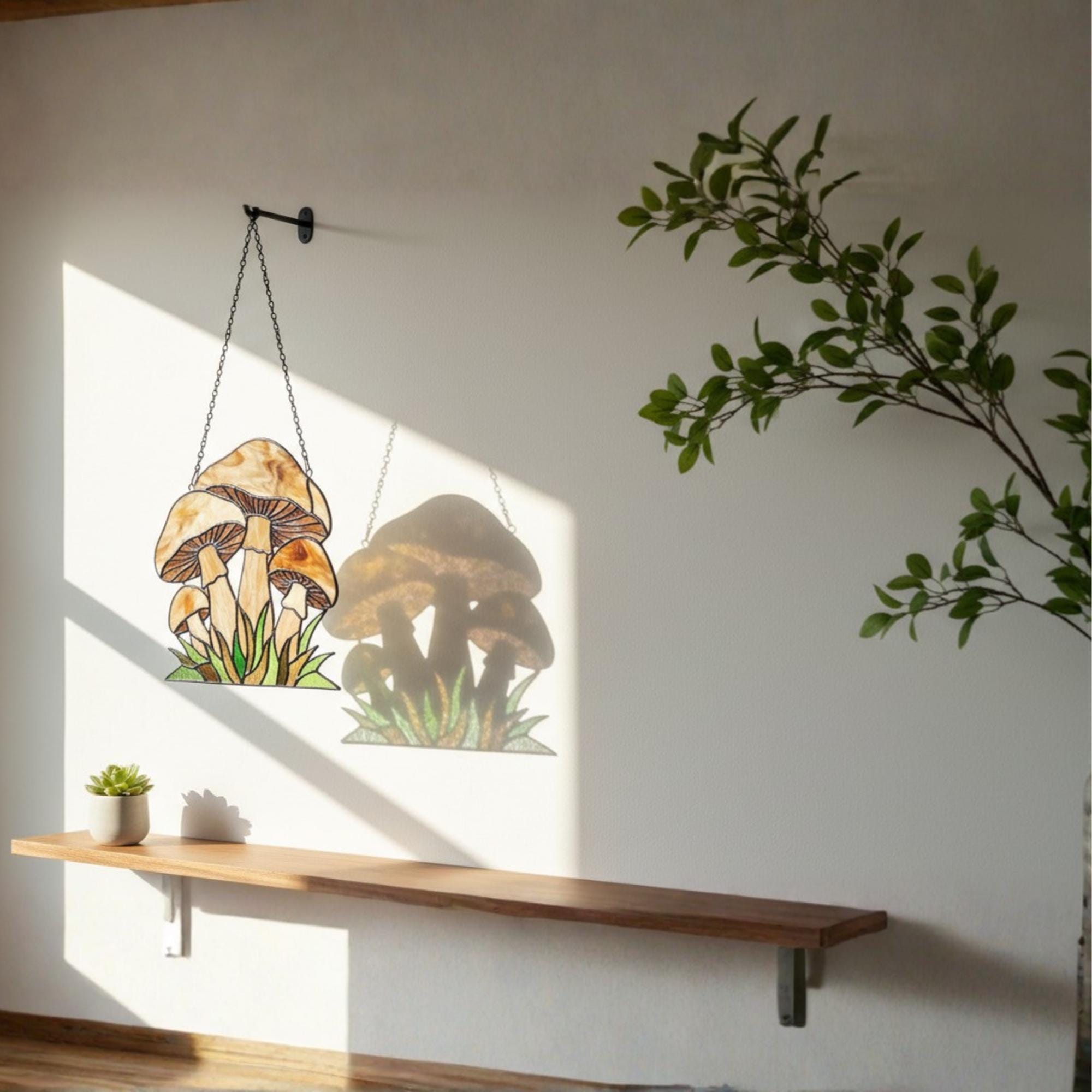 Handmade stained glass mushroom suncatcher with green grass base, colorful fungi window hanging, cottagecore forest decor for plant lovers.