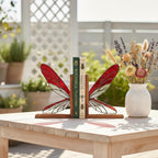 Handmade dragonfly wing stained glass bookends on premium solid oak base, green and yellow glass casting shadows, art nouveau luxury decor.