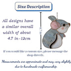 Handmade stained glass chinchilla suncatcher, cute white and grey rodent holding a branch, kawaii animal window hanging for pet lovers.