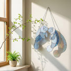 Handmade stained glass manatee suncatcher, mother and baby sea cow swimming, blue and white textured glass, ocean nursery decor, coastal window art.