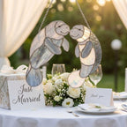 Handmade stained glass manatee suncatcher, mother and baby sea cow swimming, blue and white textured glass, ocean nursery decor, coastal window art.