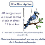Stained glass Blue Jay bird suncatcher on branch hanging on window casting blue shadows, handmade realistic nature decor for birdwatchers by LuzyGlassArt.