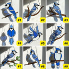 Stained glass Blue Jay bird suncatcher on branch hanging on window casting blue shadows, handmade realistic nature decor for birdwatchers by LuzyGlassArt.