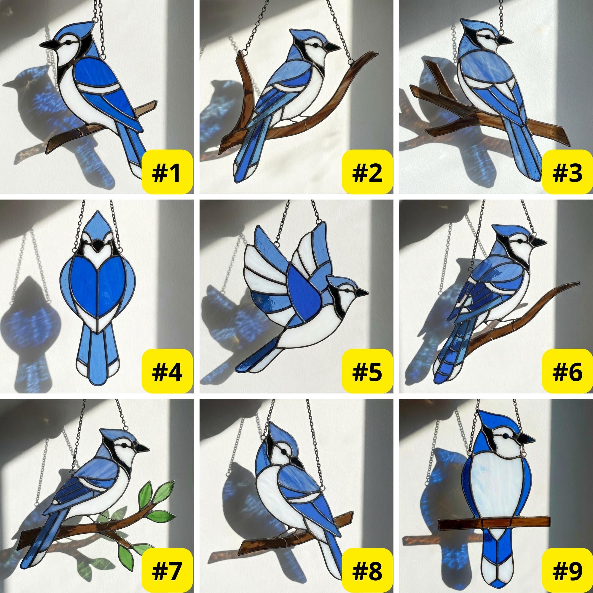 Stained glass Blue Jay bird suncatcher on branch hanging on window casting blue shadows, handmade realistic nature decor for birdwatchers by LuzyGlassArt.