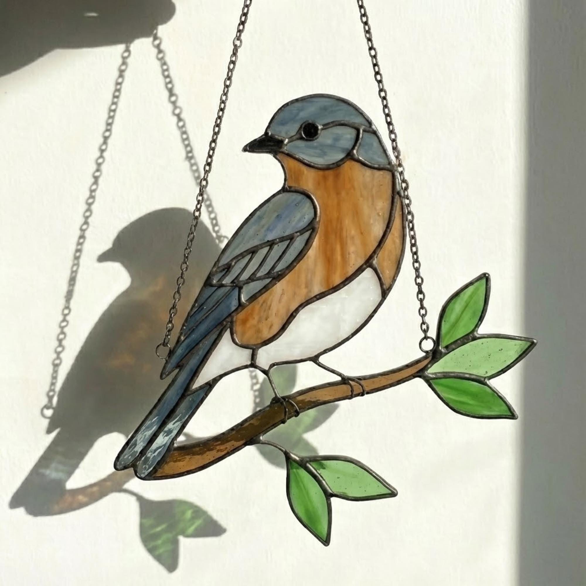 Stained glass Eastern Bluebird suncatcher with blue wings and orange breast hanging on window, handmade blue bird of happiness gift for mom, New York and Missouri state bird decor by LuzyGlassArt.