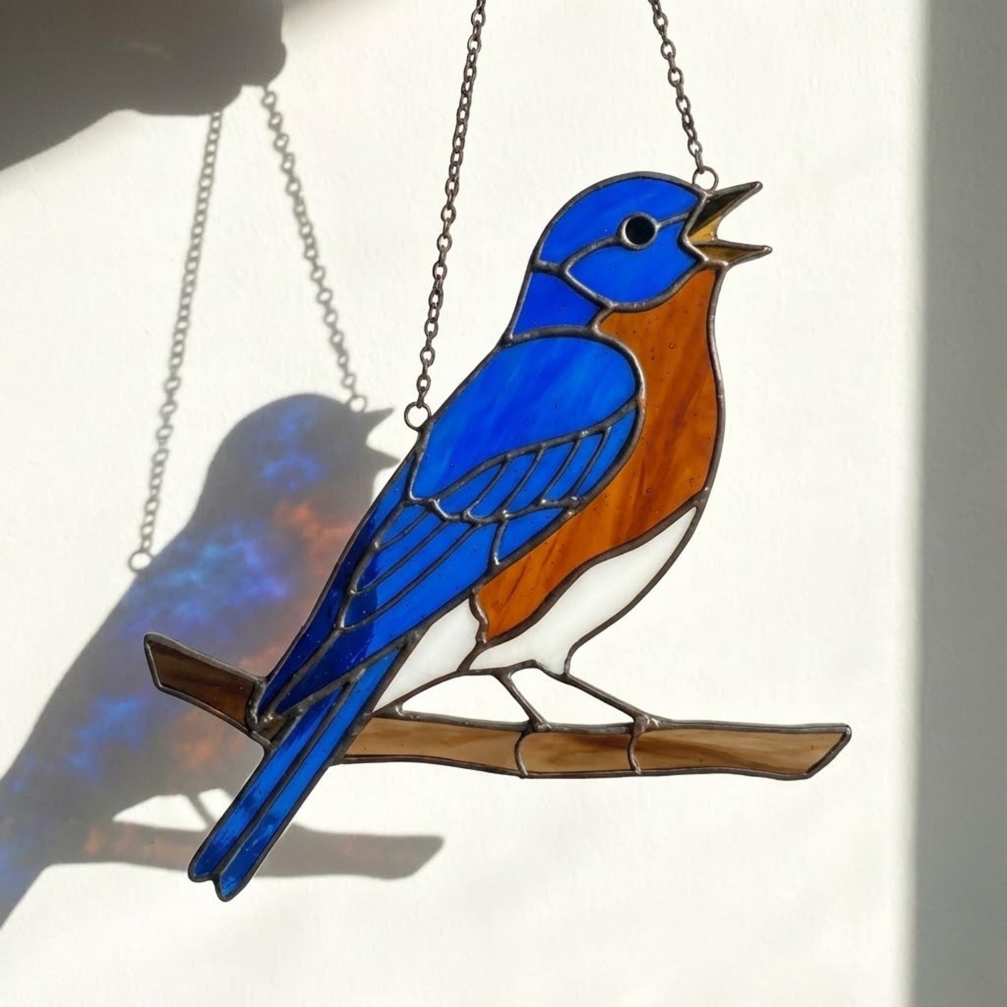 Stained glass Eastern Bluebird suncatcher with blue wings and orange breast hanging on window, handmade blue bird of happiness gift for mom, New York and Missouri state bird decor by LuzyGlassArt.