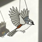 Stained glass Black-capped Chickadee bird suncatcher on branch hanging on window, handmade Maine and Massachusetts state bird gift, realistic nature decor by LuzyGlassArt.