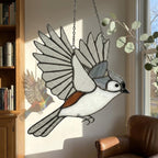 Stained glass Black-capped Chickadee bird suncatcher on branch hanging on window, handmade Maine and Massachusetts state bird gift, realistic nature decor by LuzyGlassArt.