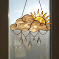Handmade stained glass sun and cloud suncatcher with hanging crystal raindrops, wispy white glass texture, celestial nursery decor, symbol of hope.