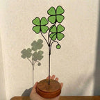Handmade stained glass four leaf clover plant sculpture standing on wooden base, green shamrock lucky gift for desk decor, st patricks day gift.