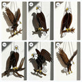 Handmade stained glass bald eagle suncatcher, realistic bird window hanging with brown and white glass, patriotic gift for dad or veteran, creating colored shadows.