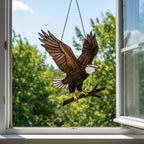 Handmade stained glass bald eagle suncatcher, realistic bird window hanging with brown and white glass, patriotic gift for dad or veteran, creating colored shadows.