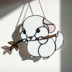 Handmade stained glass chinchilla suncatcher, cute white and grey rodent holding a branch, kawaii animal window hanging for pet lovers.