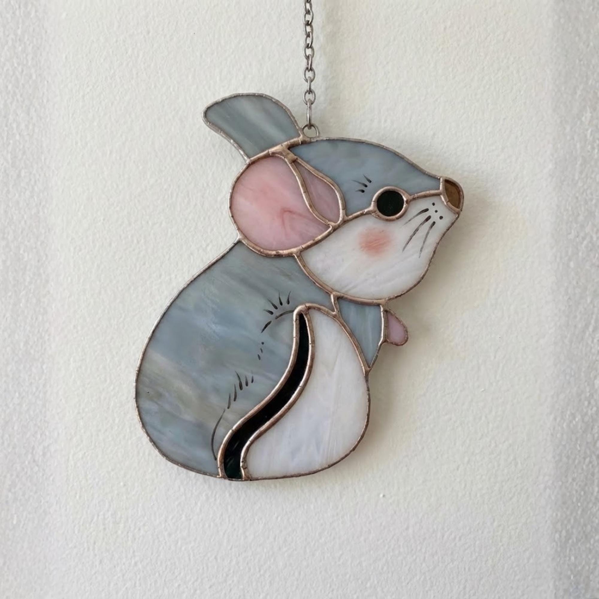 Handmade stained glass chinchilla suncatcher, cute white and grey rodent holding a branch, kawaii animal window hanging for pet lovers.