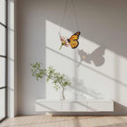 Handmade stained glass monarch butterfly perched on pink cosmos flower suncatcher, hanging window ornament, spring nature decor gift for her.