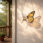 Handmade stained glass monarch butterfly perched on pink cosmos flower suncatcher, hanging window ornament, spring nature decor gift for her.