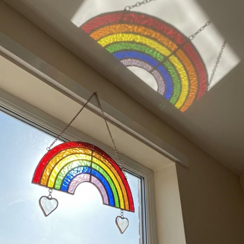 Handmade stained glass rainbow suncatcher with personalized wooden name tag, rainbow bridge pet memorial gift for dog or cat loss, hanging glass hearts.