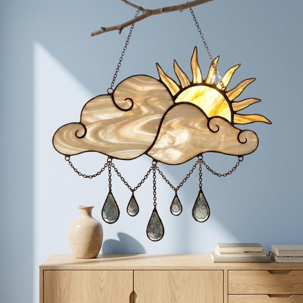 Handmade stained glass sun and cloud suncatcher with hanging crystal raindrops, wispy white glass texture, celestial nursery decor, symbol of hope.