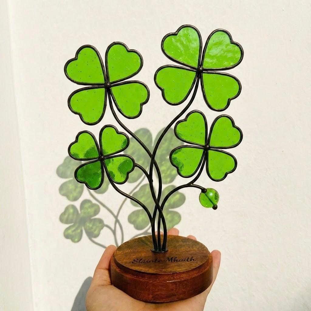 Handmade stained glass four leaf clover plant sculpture standing on wooden base, green shamrock lucky gift for desk decor, st patricks day gift.