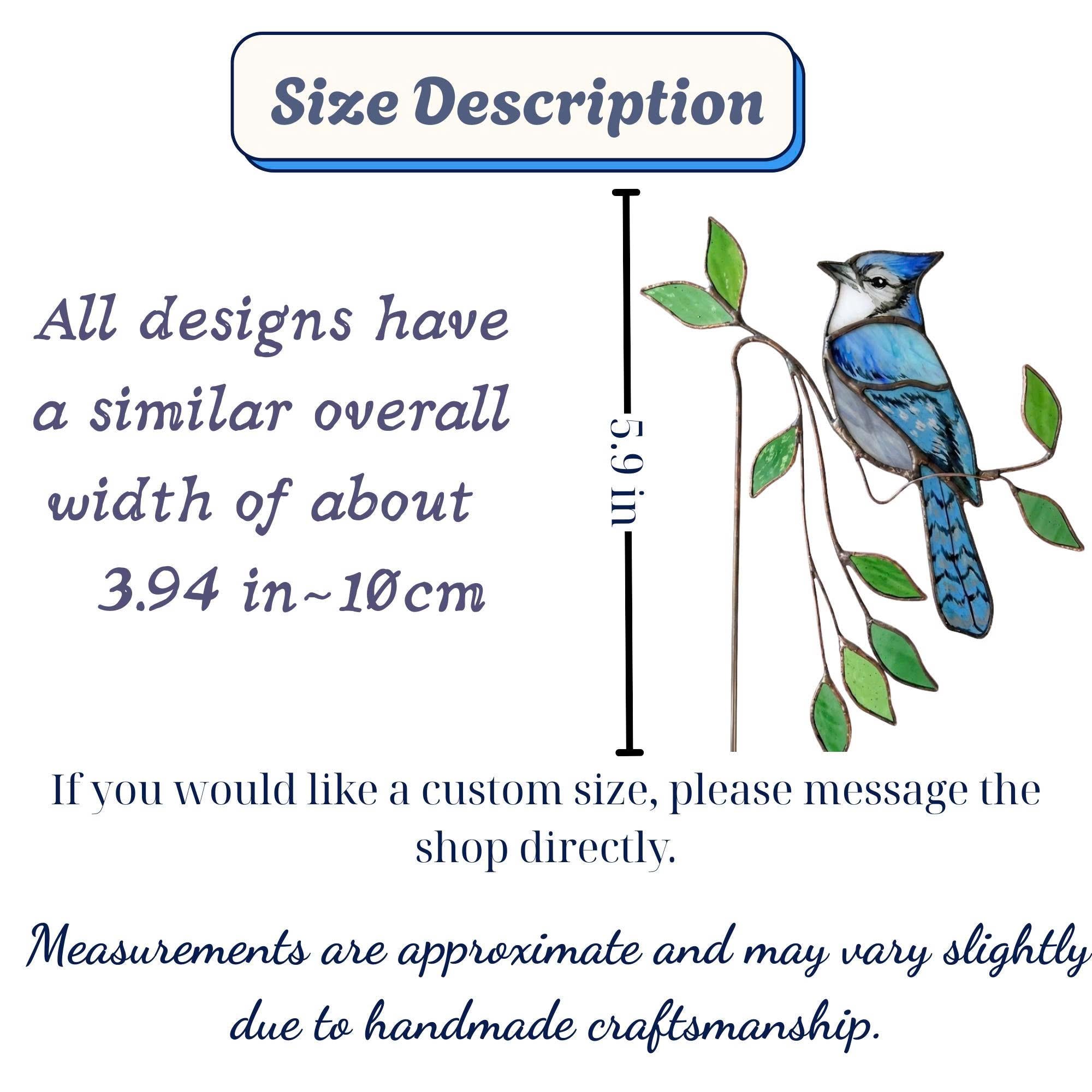 Handmade stained glass plant stakes collection including hummingbird, cardinal, blue jay birds, monarch butterfly, dragonfly, and flowers attached to metal rods for indoor plant pot decoration.