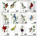 Handmade stained glass plant stakes collection including hummingbird, cardinal, blue jay birds, monarch butterfly, dragonfly, and flowers attached to metal rods for indoor plant pot decoration.