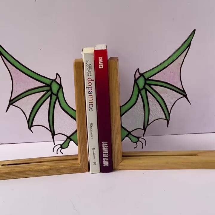 Handmade stained glass dragon wing bookends with solid oak wood base, fantasy bookshelf decor for book lovers and dark academia library