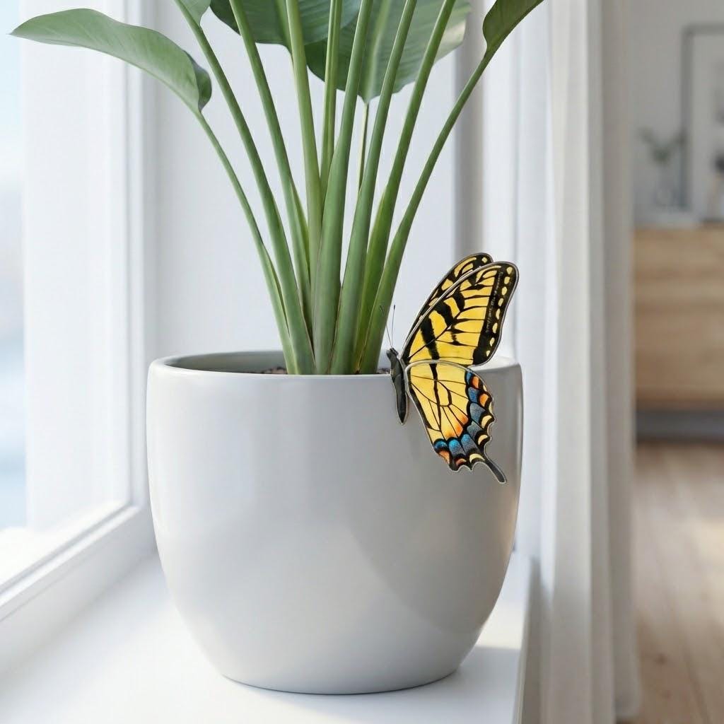 Handmade stained glass monarch butterfly plant stake with vibrant orange and black wings, suncatcher pot sitter for indoor plants, gift for butterfly lover.