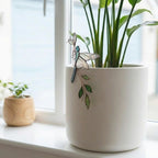 Handmade stained glass dragonfly plant stake with iridescent wings and metal rod, suncatcher pot sitter for indoor plants, gardening gift for mom.