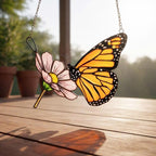 Handmade stained glass monarch butterfly perched on pink cosmos flower suncatcher, hanging window ornament, spring nature decor gift for her.