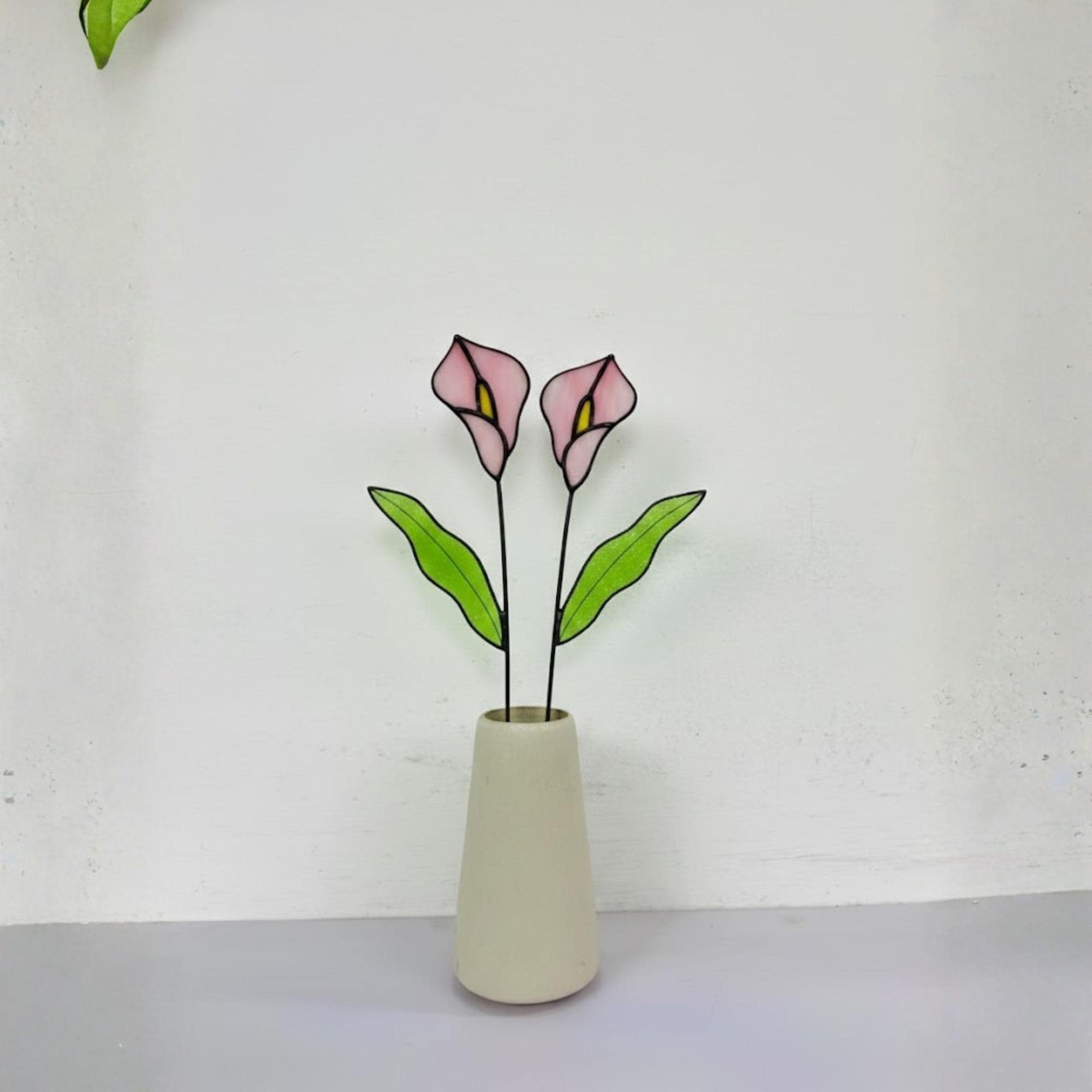 Handmade stained glass calla lily flower stems arranged in a minimalist vase, botanical glass flower home decor
