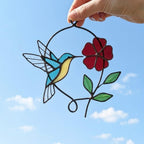 Handmade stained glass blue hummingbird and red spring flower suncatcher in copper wire hoop, floral window hanging gift for mother's day.