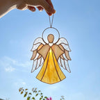 Handmade stained glass guardian angel suncatcher with amber dress and iridescent wings, premium memorial sympathy gift and christian window hanging decor.