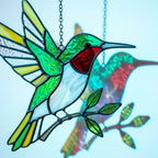 Handmade stained glass flying hummingbird and red flower hoop suncatcher, vibrant spring window hanging and memorial sympathy gift for mom.