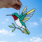 Handmade stained glass flying hummingbird and red flower hoop suncatcher, vibrant spring window hanging and memorial sympathy gift for mom.