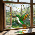Handmade stained glass hummingbird suncatchers in colorful blue green red purple and yellow, vibrant spring window hanging and meaningful mother's day memorial gift.