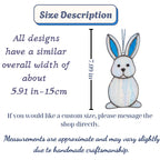 Handmade stained glass cute bunny rabbit suncatcher in iridescent pastel colors, perfect easter window decor and spring nursery room wall hanging gift.